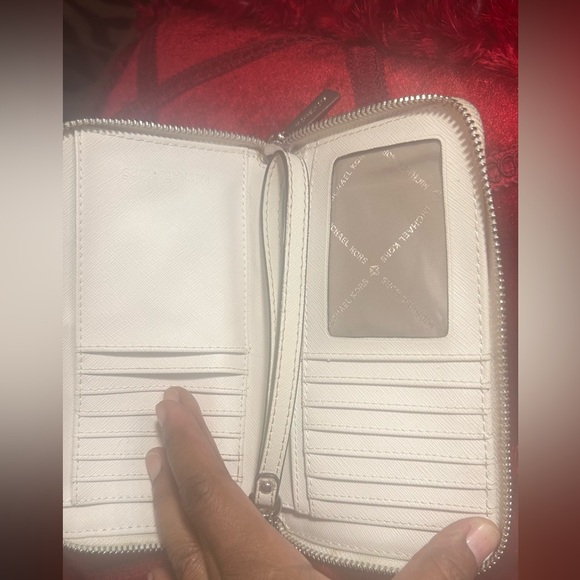 •SALE•Michael Kors Cream Wallet with a Wristlet Strap: Clean Used Condition - Picture 6 of 16